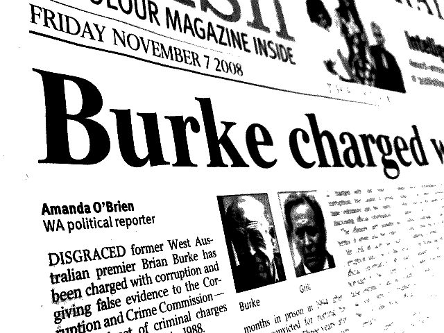 Burke Charged with
                                          Corruption